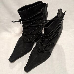 Sacha Too black leather lace up front detail. Back zipper for easy slip in.